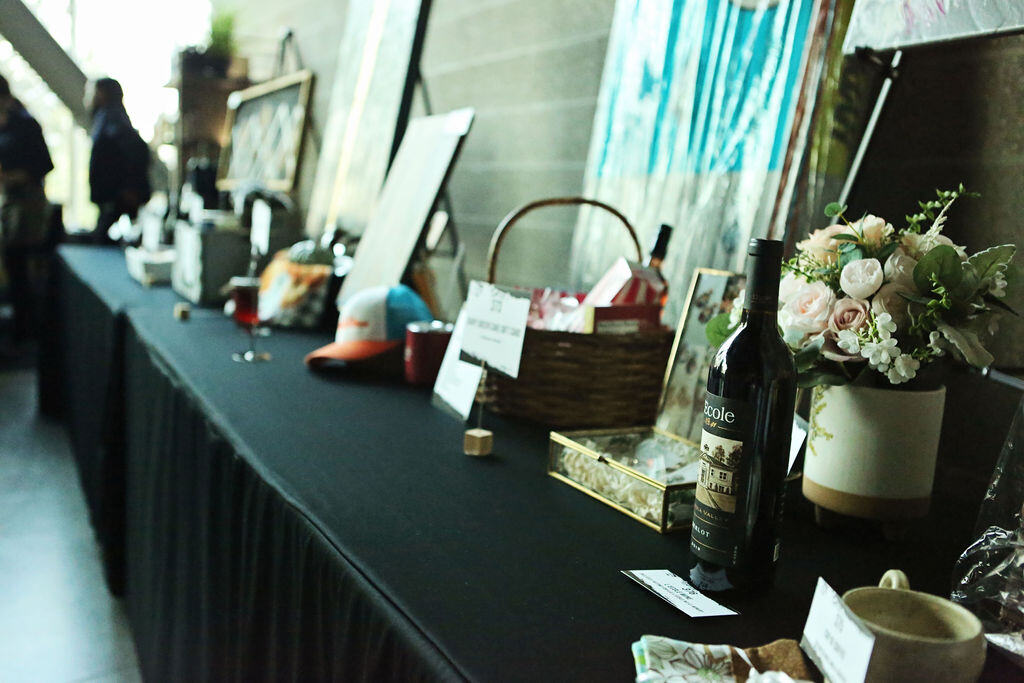 Banquet table with Cancer Can't auction items for the Cancer Can't Gala